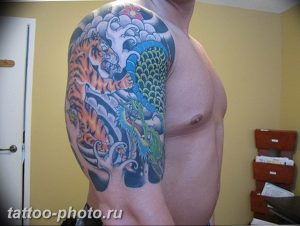 фото тату тигр и дракон 07.12.2018 №039 - tattoo tiger and dragon - tattoo-photo.ru